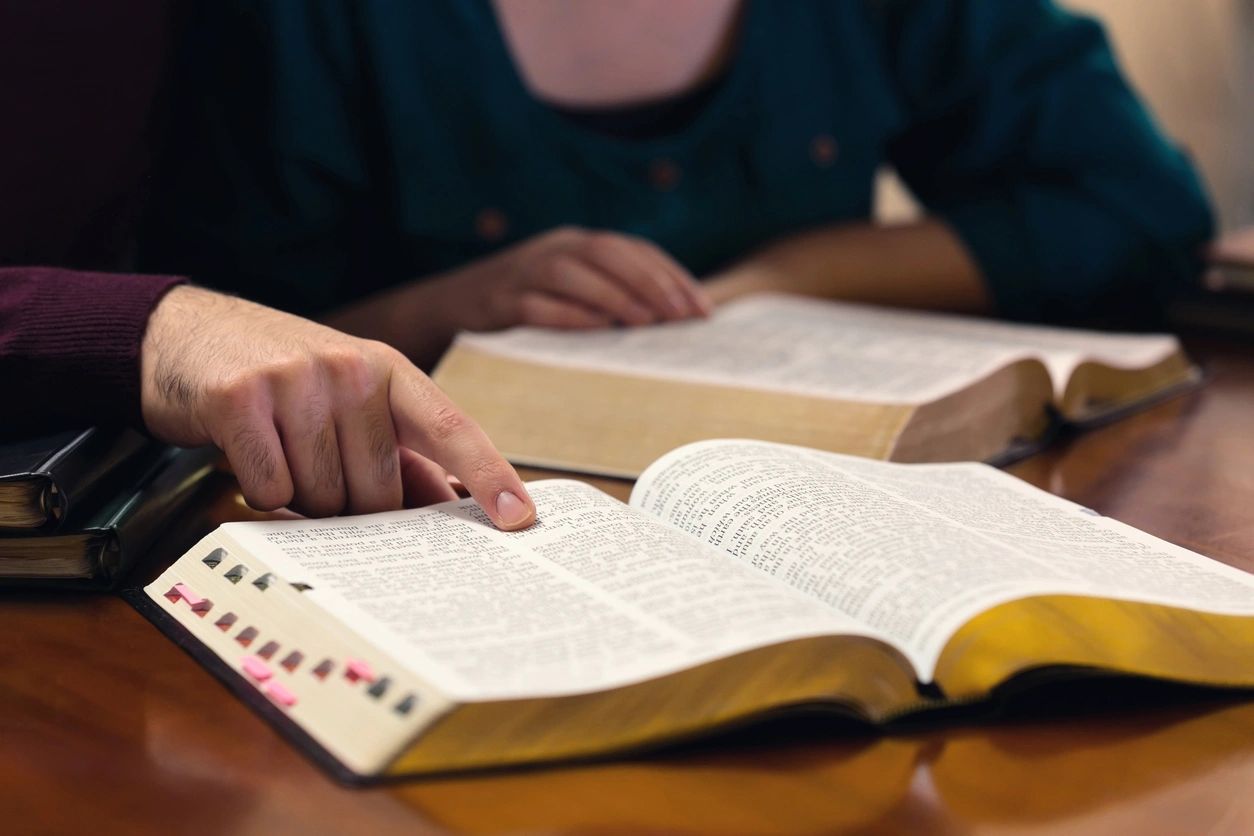 Open books representing theological study